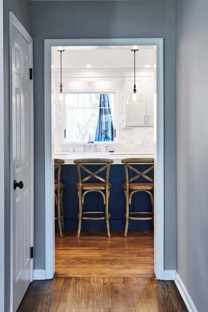 Vertical Island in Ardmore, PA kitchen remodel — White Shaker cabinetry