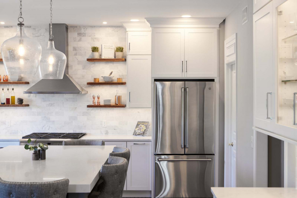 Range Hood in Chadds Ford, PA kitchen remodel — White frameless Shaker cabinetry