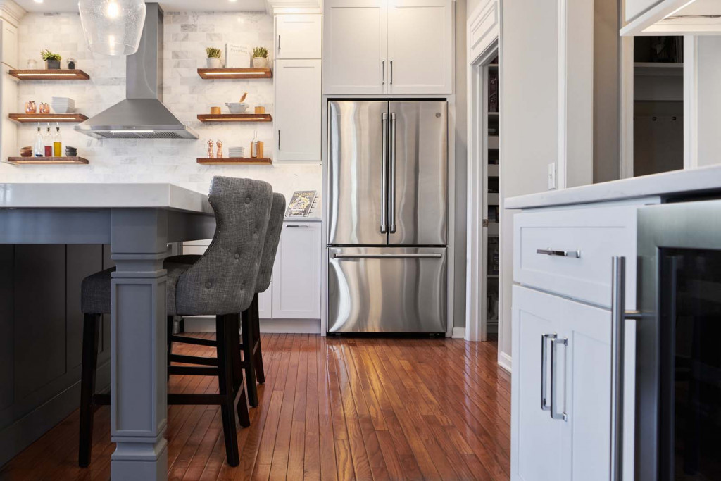 Tufted Stools in Chadds Ford, PA kitchen remodel — White frameless Shaker cabinetry