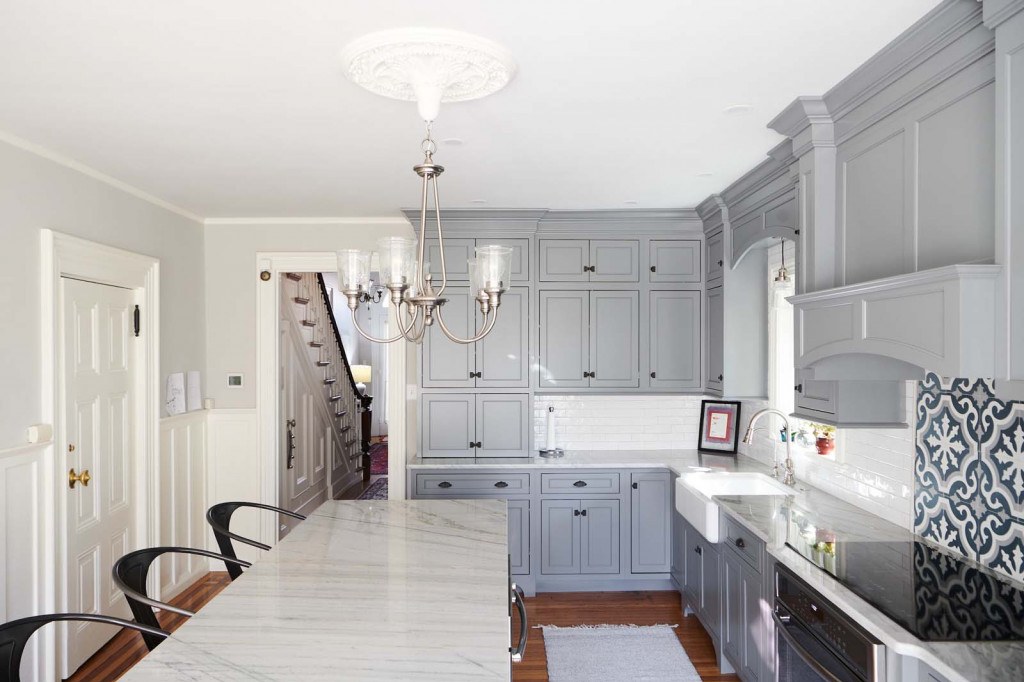 Devon blue tile kitchen remodel with custom cabinetry