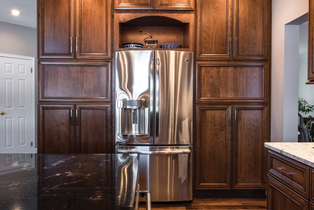 Arched Niche in Downingtown, PA kitchen remodel — Two-tone raised-panel cabinetry