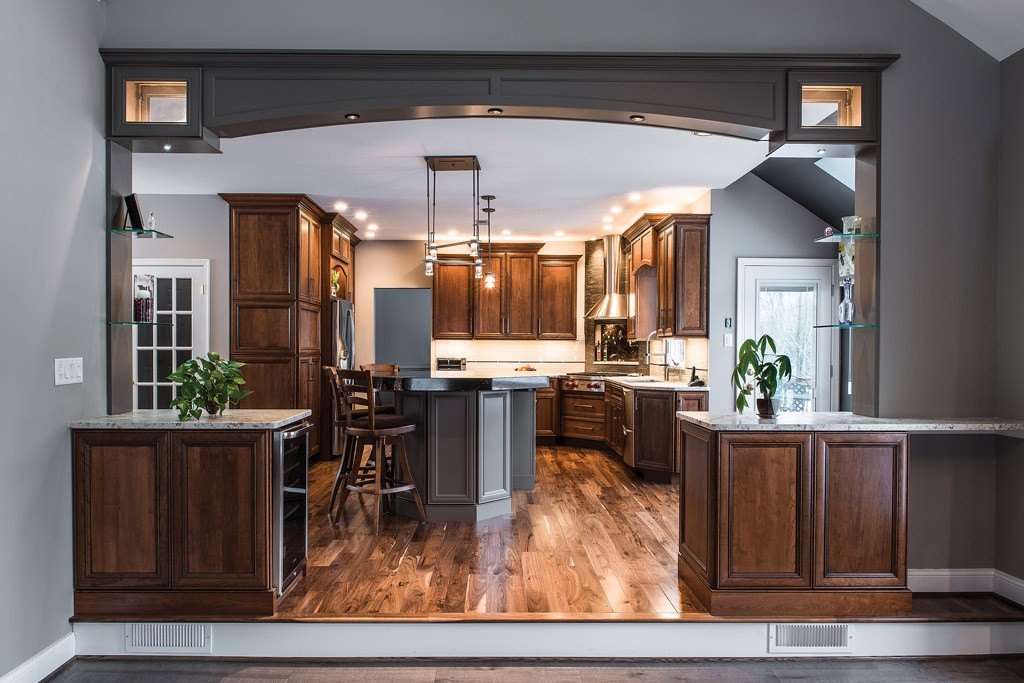 Two-tone raised-panel cabinetry kitchen with stained cherry uppers and painted gray island in Downingtown, PA — kitchen remodel by Fedor Fabrication