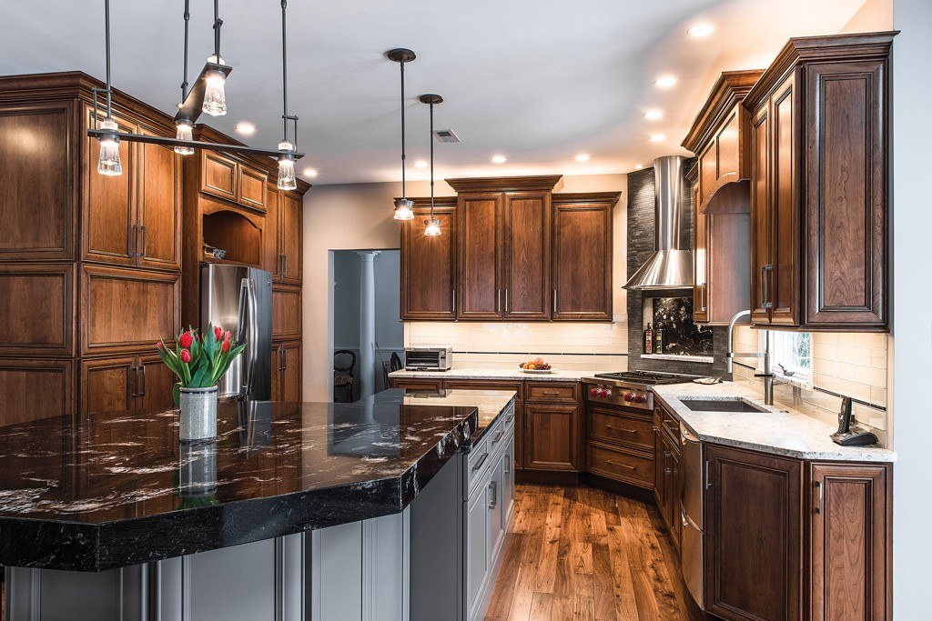 Black Granite in Downingtown, PA kitchen remodel — Two-tone raised-panel cabinetry