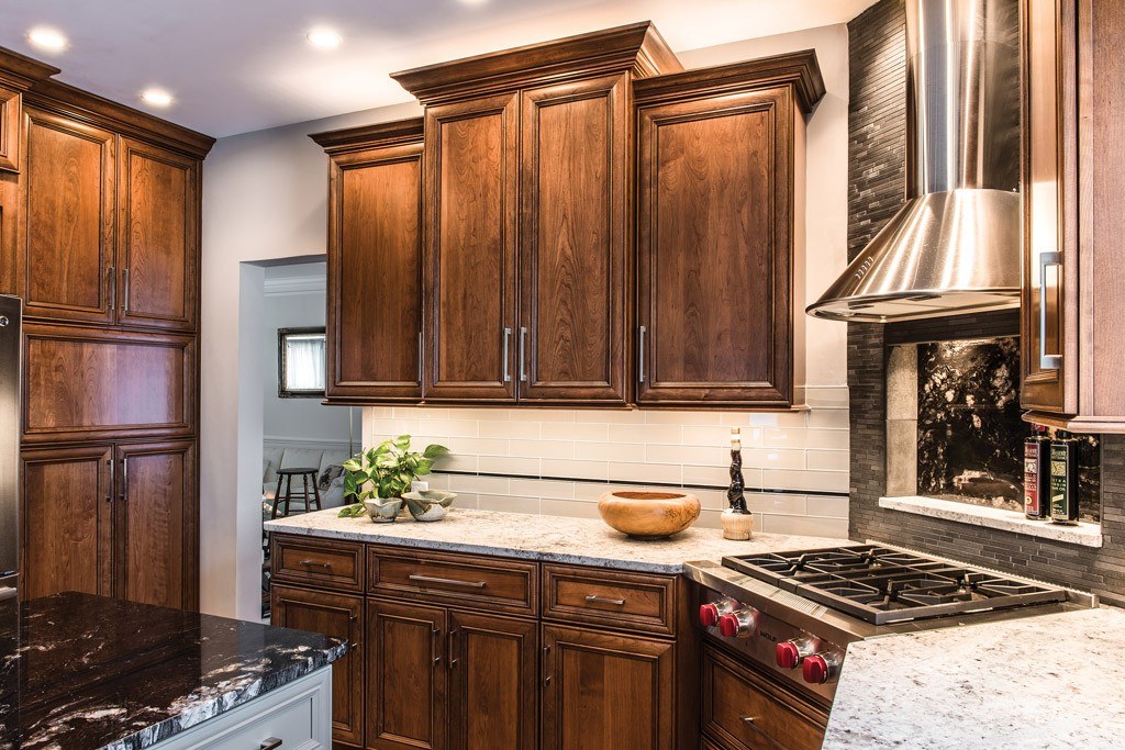 Cherry Uppers in Downingtown, PA kitchen remodel — Two-tone raised-panel cabinetry