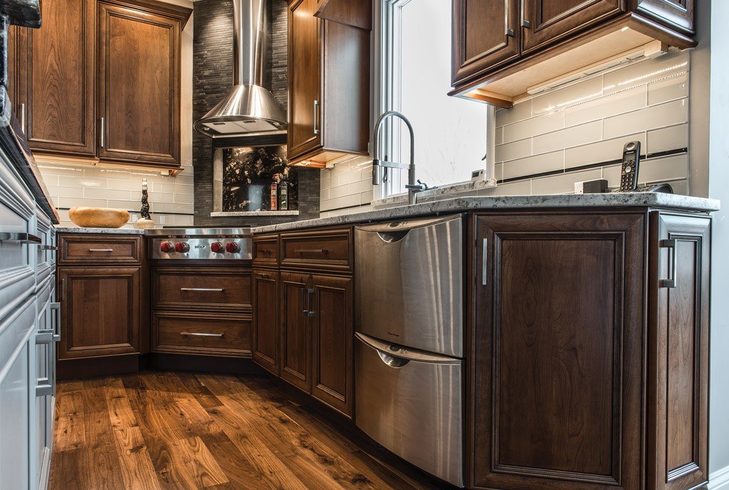 Galley Cooktop in Downingtown, PA kitchen remodel — Two-tone raised-panel cabinetry