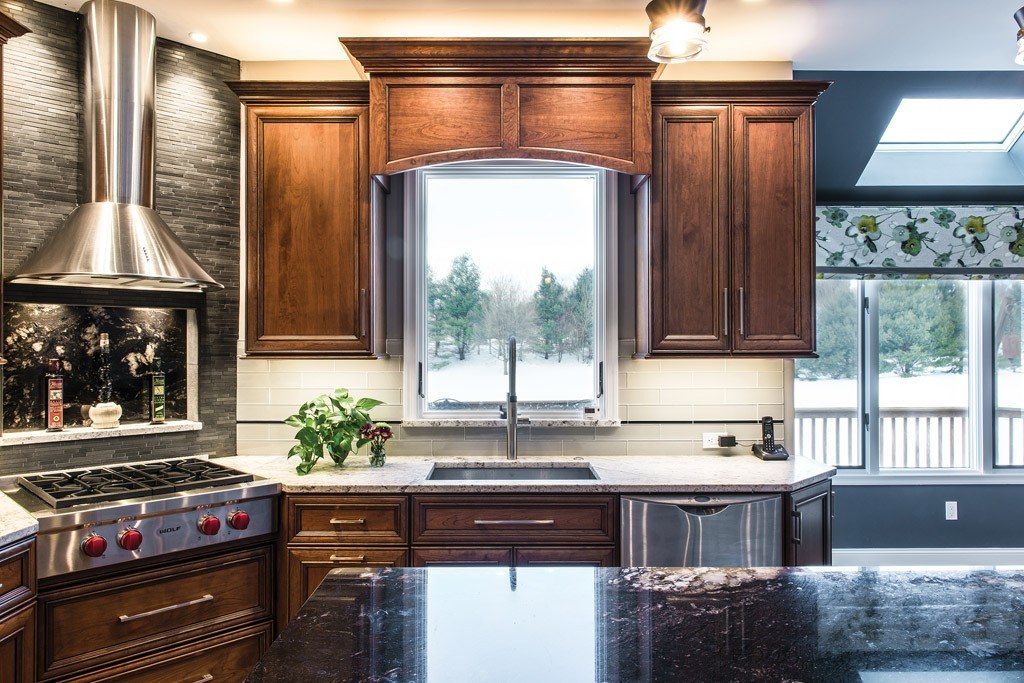 Wolf Range in Downingtown, PA kitchen remodel — Two-tone raised-panel cabinetry