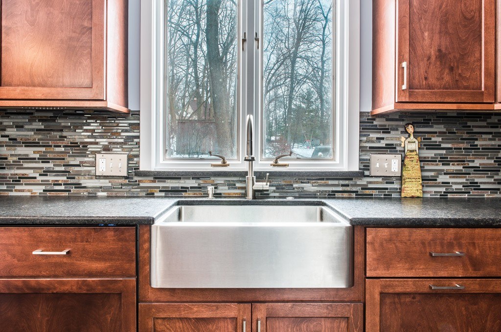 Glass Mosaic in Exton, PA kitchen remodel — Stained cherry Shaker cabinetry