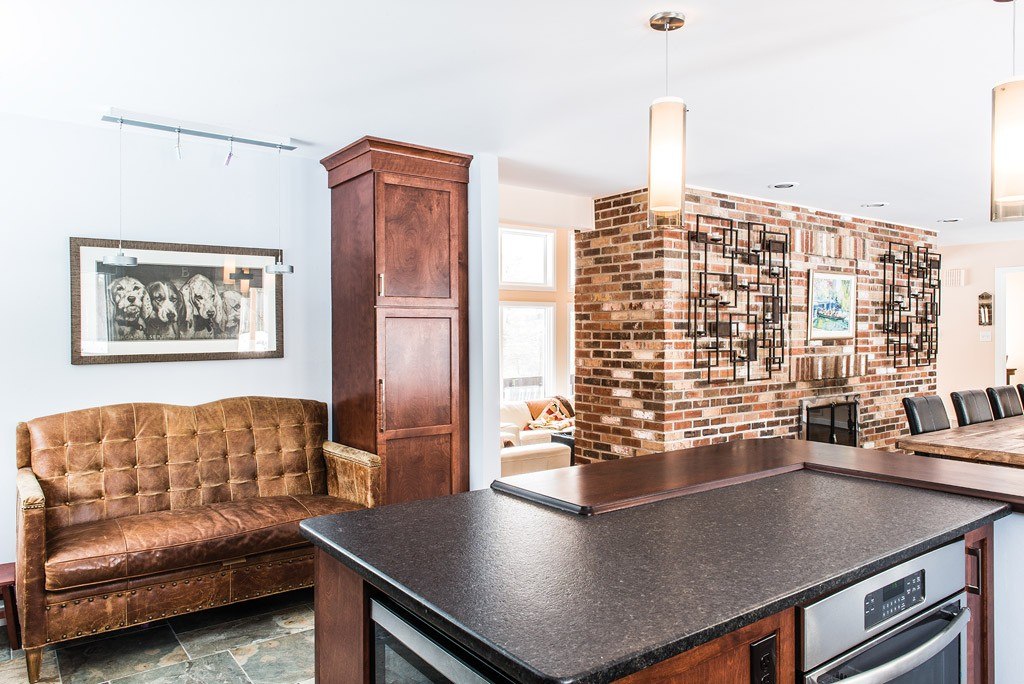 Leather Settee in Exton, PA kitchen remodel — Stained cherry Shaker cabinetry