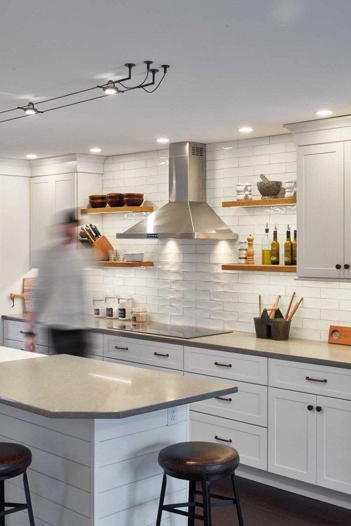 Exton Nordic kitchen detail with reclaimed-wood floating shelves and white handmade-look subway tile