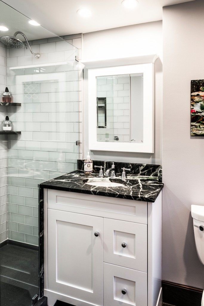 White painted Shaker single vanity in Kennett Square, PA bathroom remodel — White Shaker vanity