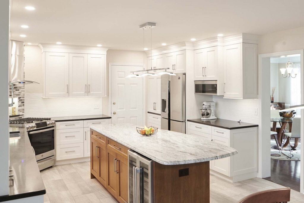 Arched Hood in Kennett Square, PA kitchen remodel — White Shaker cabinetry