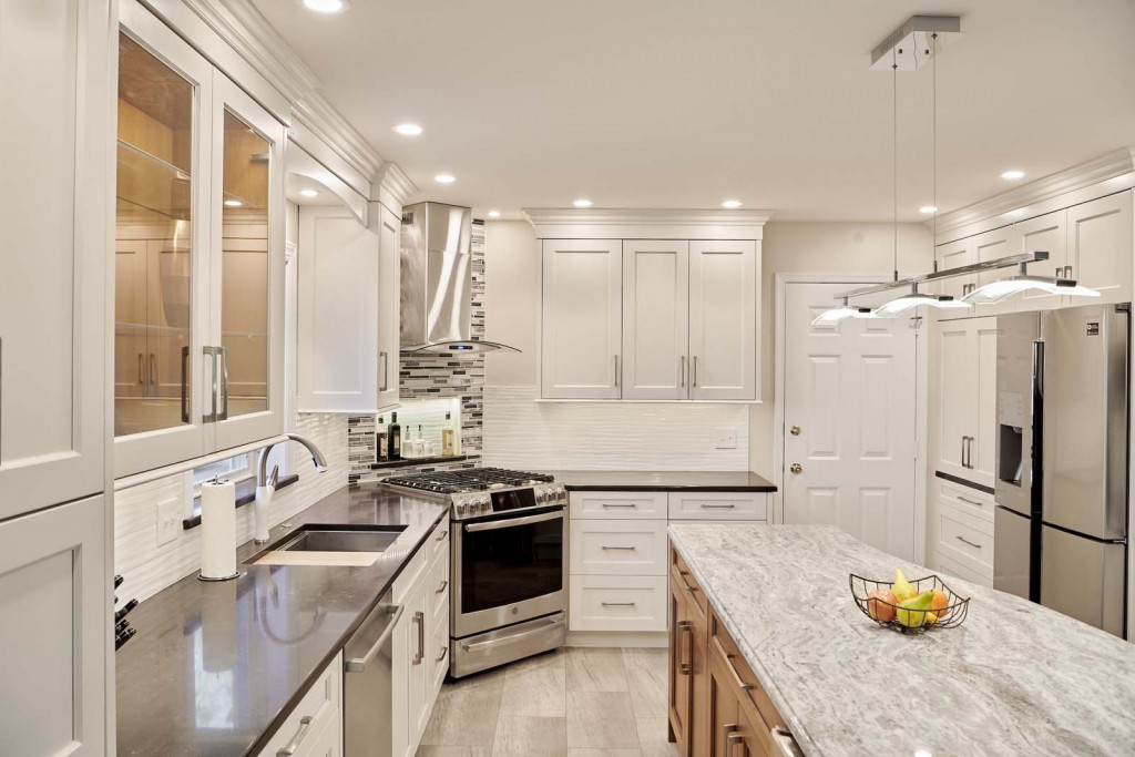 Glass Uppers in Kennett Square, PA kitchen remodel — White Shaker cabinetry