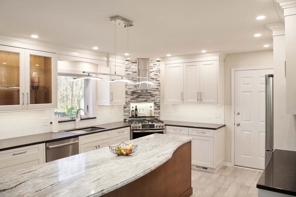 Mosaic Backsplash in Kennett Square, PA kitchen remodel — White Shaker cabinetry