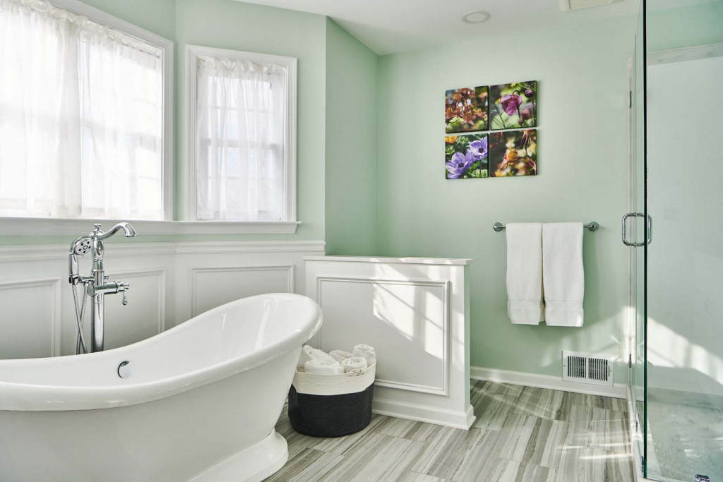 Modern angular freestanding soaker tub in Malvern, PA bathroom remodel — Mint primary bath