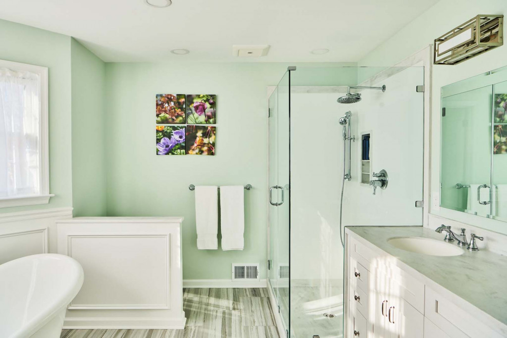 Overview of glass shower and double vanity in Malvern, PA bathroom remodel — Mint primary bath