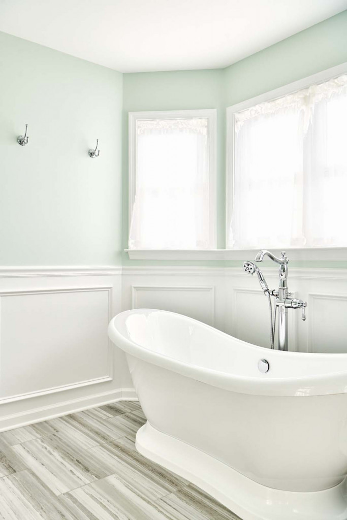 White slipper tub vertical view in Malvern, PA bathroom remodel — Mint primary bath