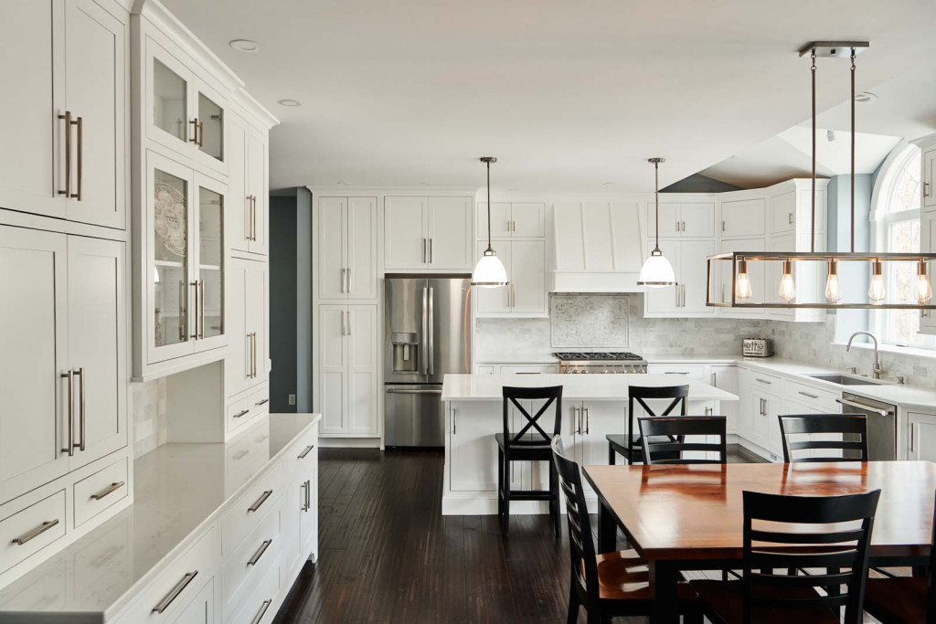 Fridge Island in Malvern, PA kitchen remodel — White inset Shaker cabinetry