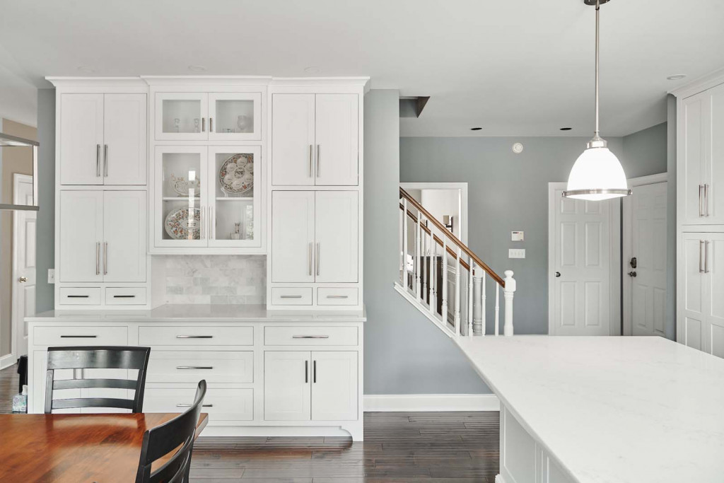 Glass Display in Malvern, PA kitchen remodel — White inset Shaker cabinetry