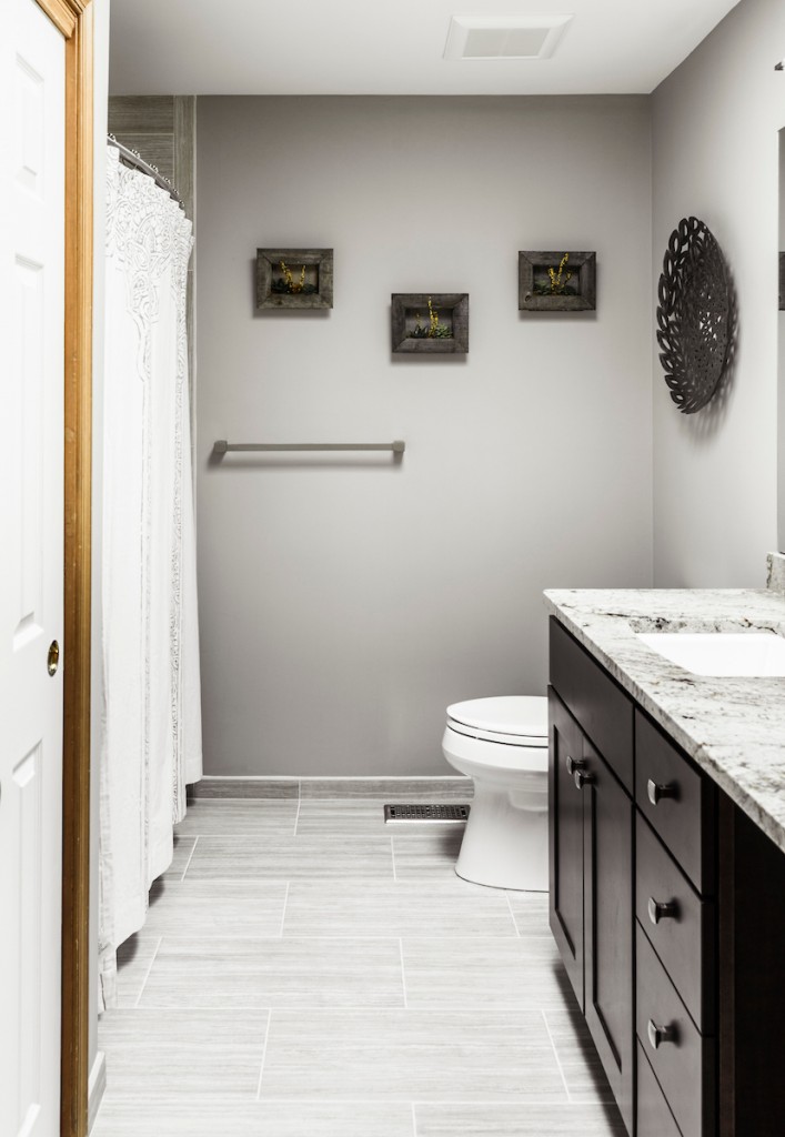 Vanity vignette with reclaimed wood shadow boxes in Media, PA bathroom remodel — Espresso Shaker vanity