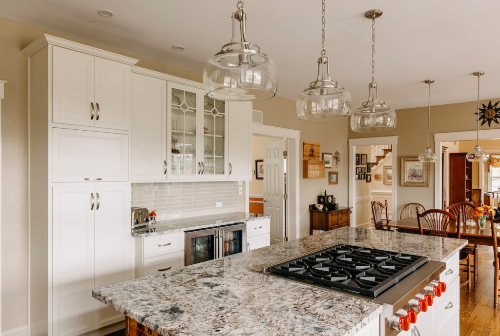 Dining View in Media, PA kitchen remodel — White recessed-panel cabinetry