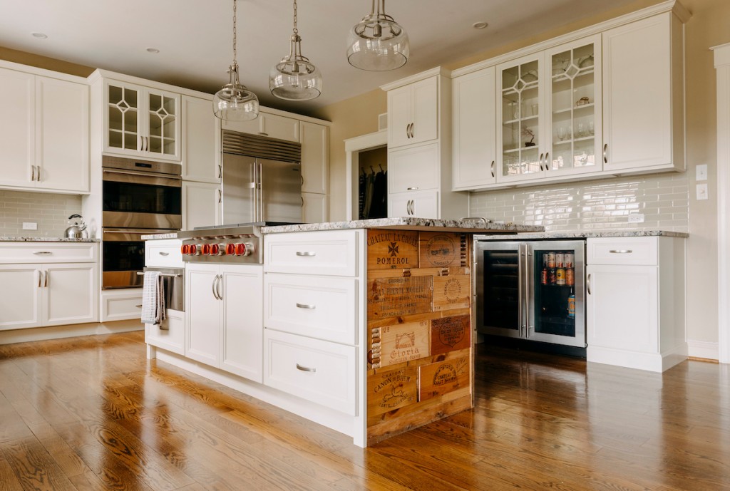 Glass Uppers in Media, PA kitchen remodel — White recessed-panel cabinetry