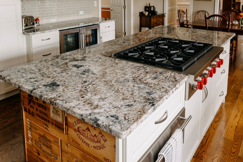 Granite Detail in Media, PA kitchen remodel — White recessed-panel cabinetry