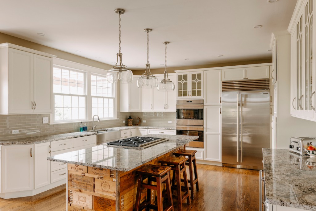 Island Overview in Media, PA kitchen remodel — White recessed-panel cabinetry