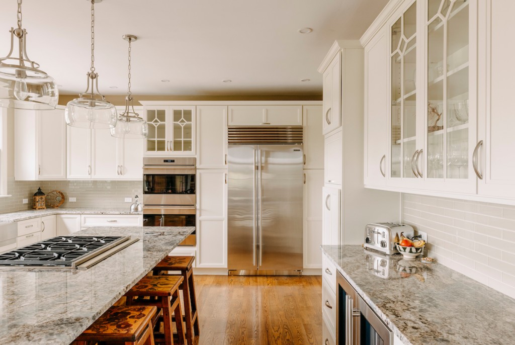 Wall Ovens in Media, PA kitchen remodel — White recessed-panel cabinetry