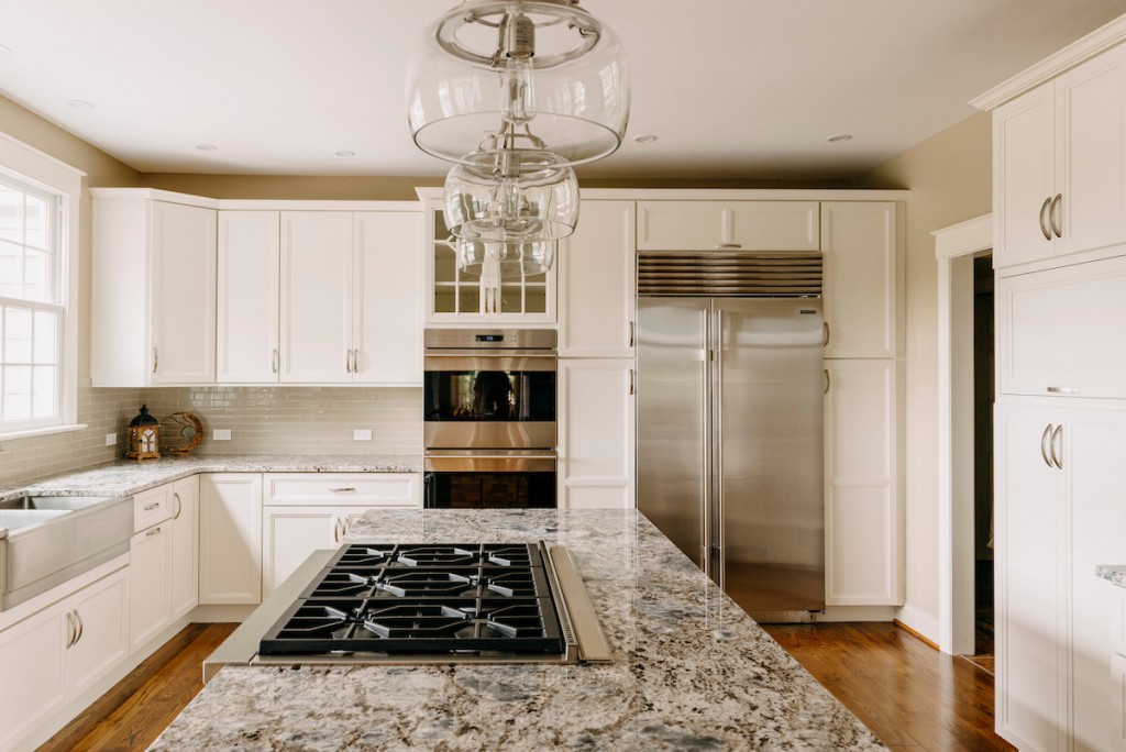 Wolf Cooktop in Media, PA kitchen remodel — White recessed-panel cabinetry