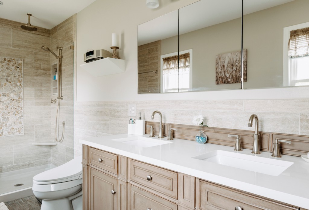Double vanity with chrome bar pulls in Newtown Square, PA bathroom remodel — Cerused oak raised-panel double vanity