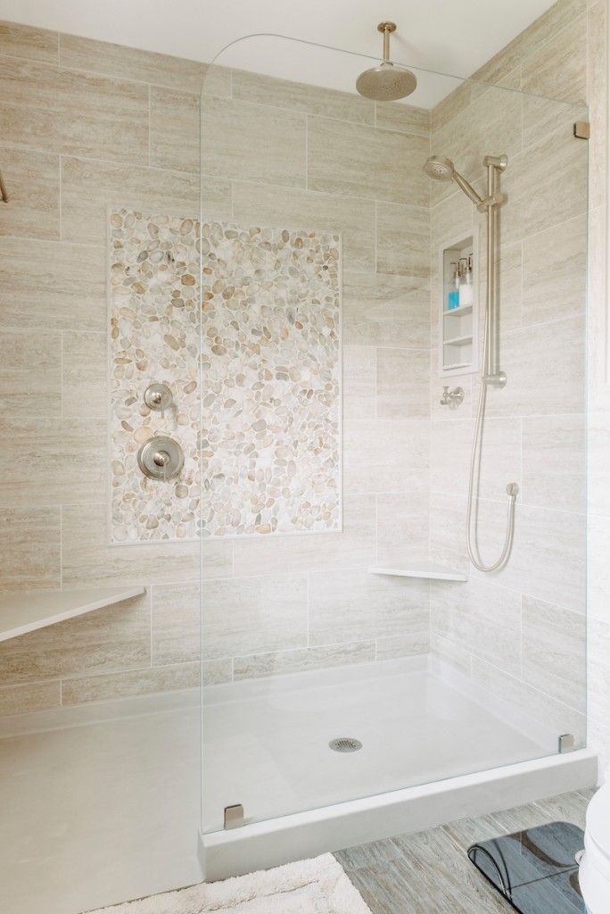 Shower niche with marble bench and corner shelves in Newtown Square, PA bathroom remodel — Cerused oak raised-panel double vanity