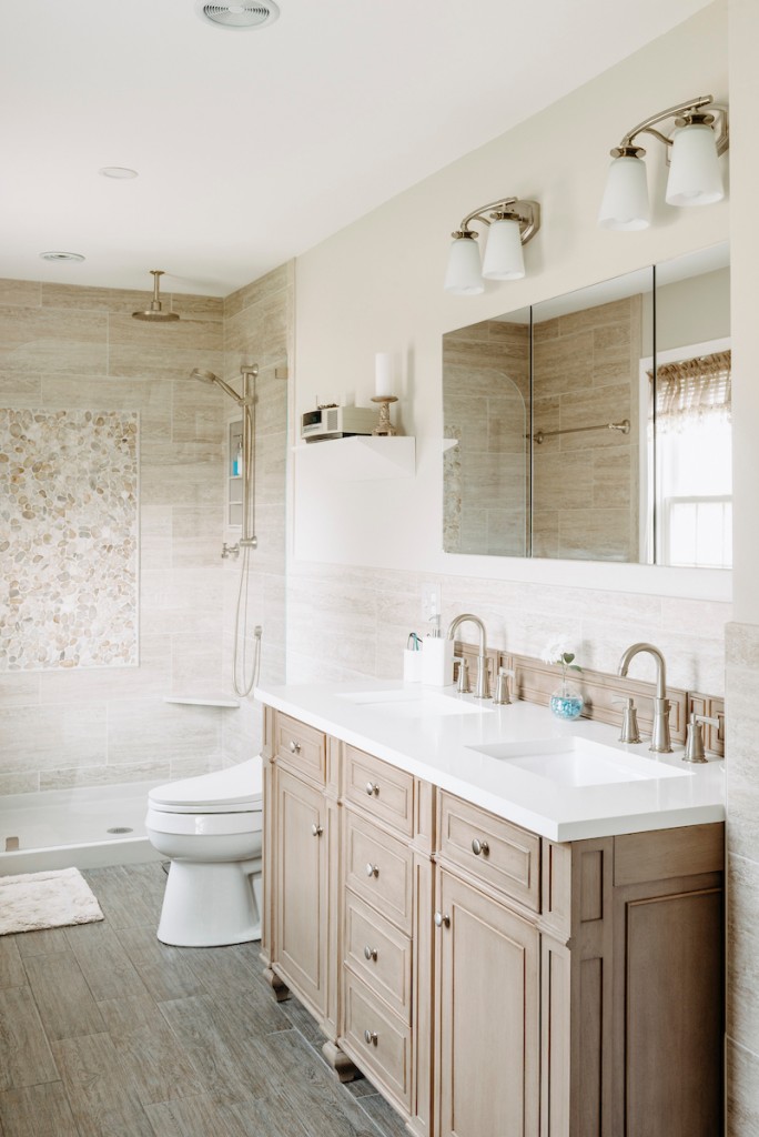 Cerused oak raised-panel vanity with curbless shower in Newtown Square, PA bathroom remodel — Cerused oak raised-panel double vanity