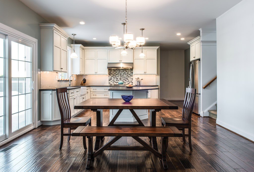 Bench Dining in Paoli, PA kitchen remodel — Cream glazed Shaker cabinetry