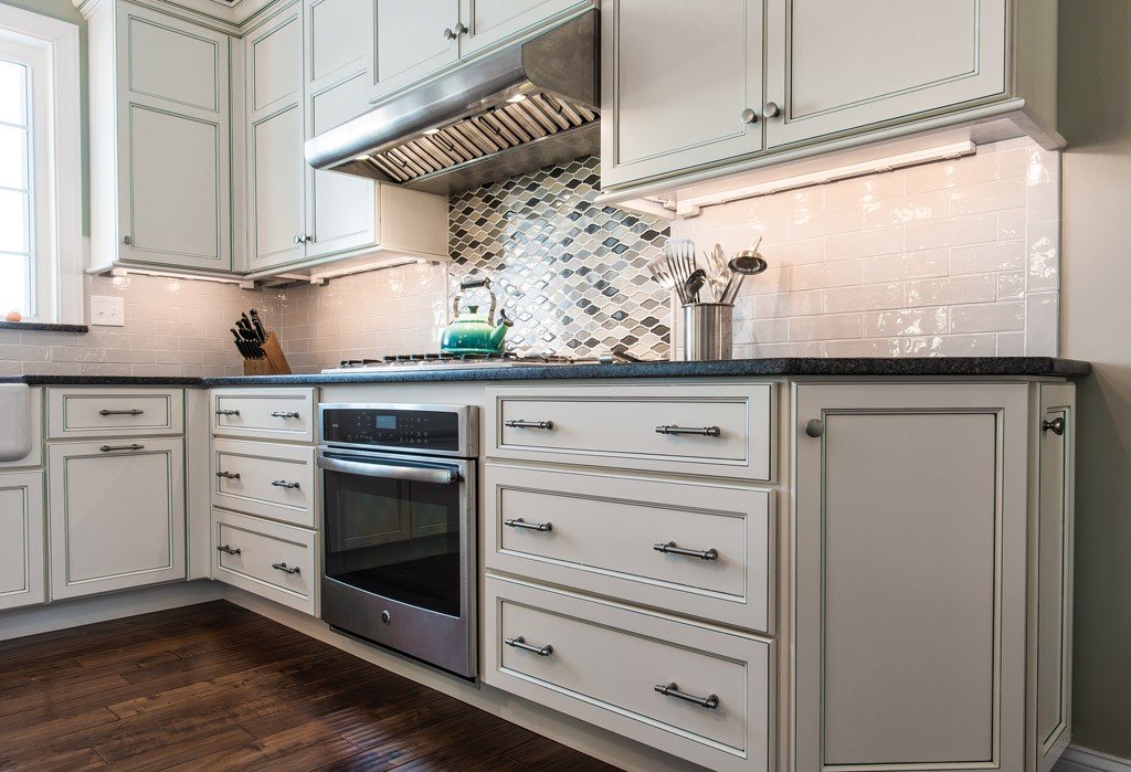 Stainless Hood in Paoli, PA kitchen remodel — Cream glazed Shaker cabinetry