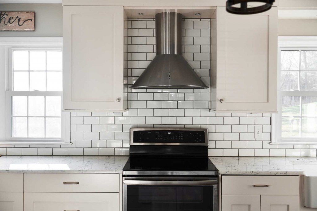 Villanova kitchen close-up of the dark-grout white subway tile backsplash field