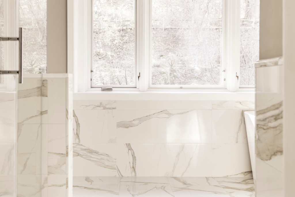 Calacatta-look porcelain veining detail in Wayne, PA bathroom remodel — Quiet luxury master bath in Calacatta-look large-slab porcelain