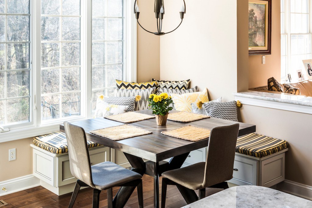 Wayne kitchen view across the granite island toward the cooktop wall with mosaic accent backsplash and pot filler