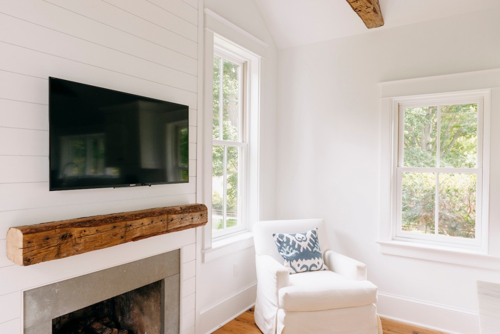 Mantel Fireplace in Wayne, PA kitchen remodel — White inset Shaker cabinetry