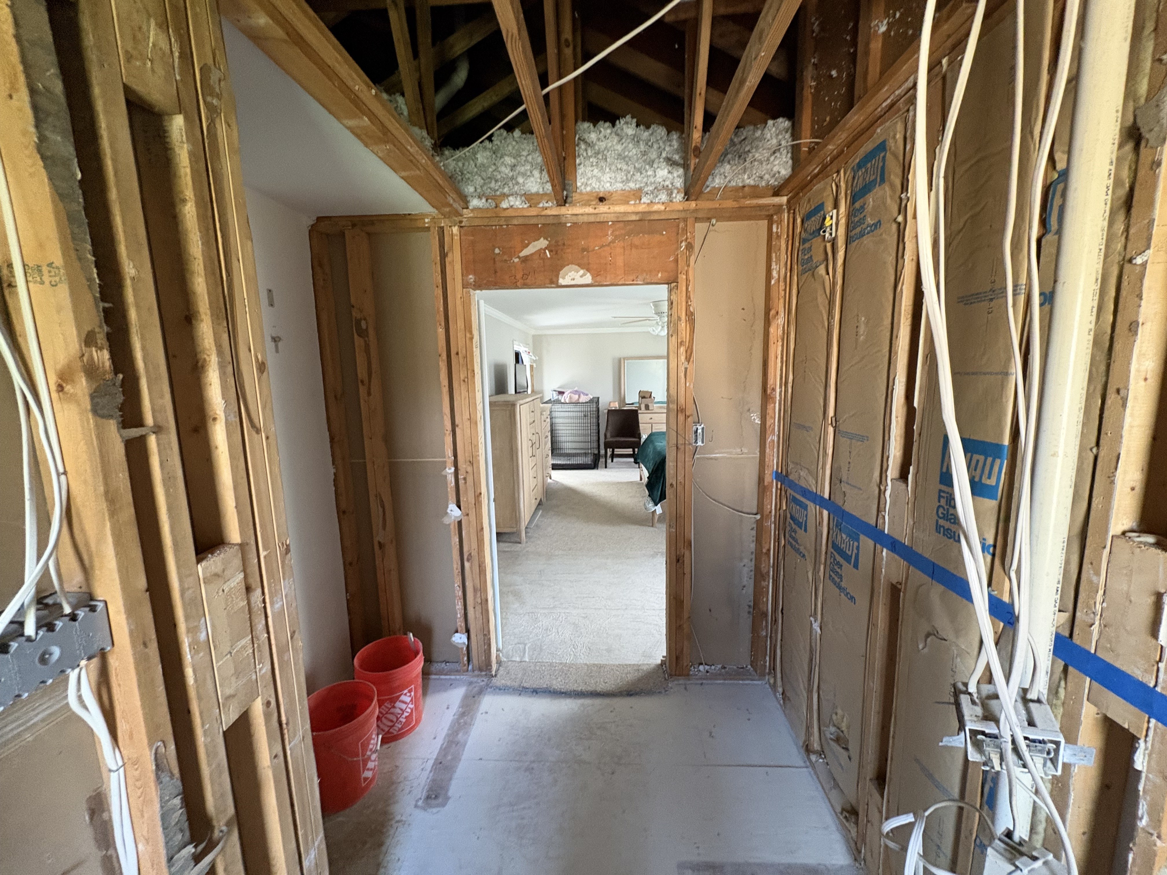 Bathroom open to the framing during the demo phase
