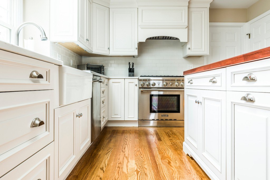 Wayne kitchen view toward the family room from the island showing the open layout and reclaimed-wood butcher-block top