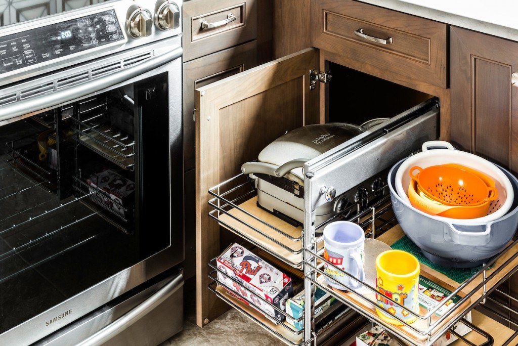 West Chester kitchen magic-corner blind-corner pullout extended, showing swing-and-pivot chrome wire shelving