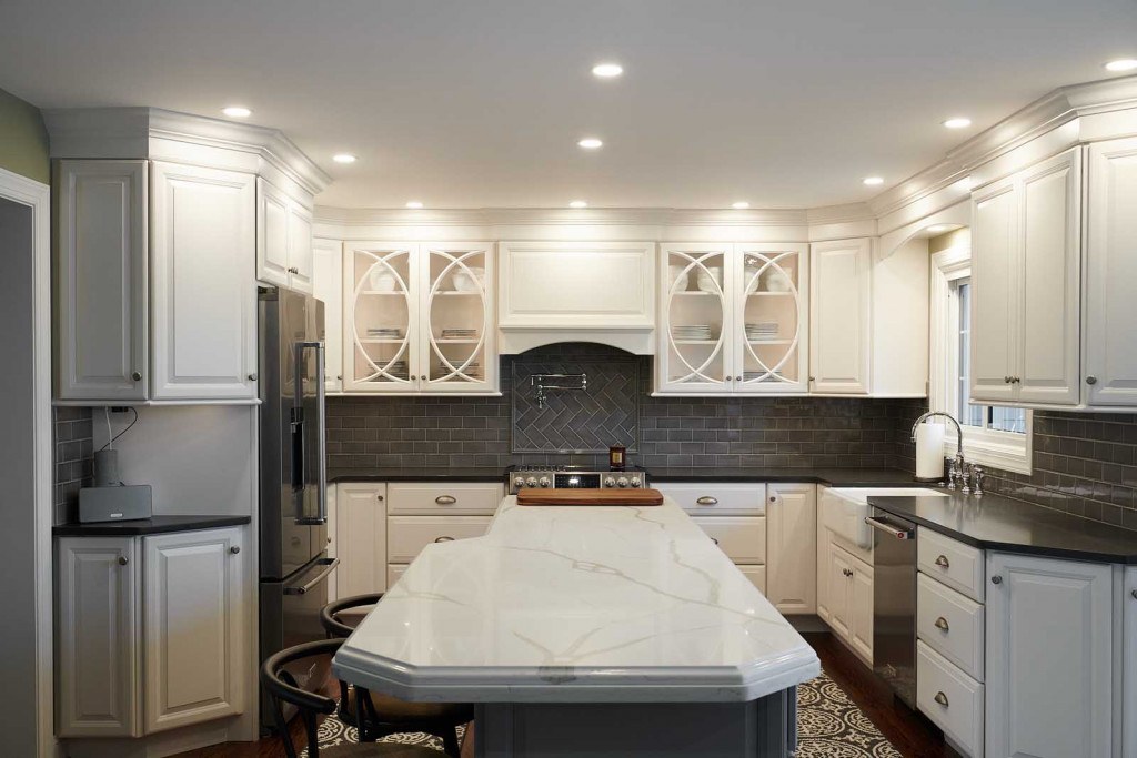 West Chester twist-on-white kitchen view down the perimeter run with raised-panel custom cabinets