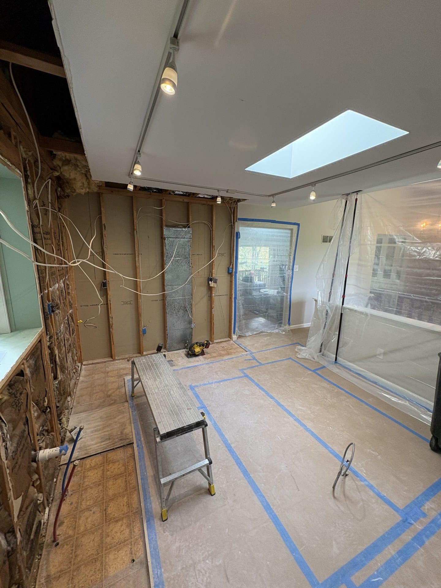Chester Springs kitchen during demolition with walls opened and dust containment