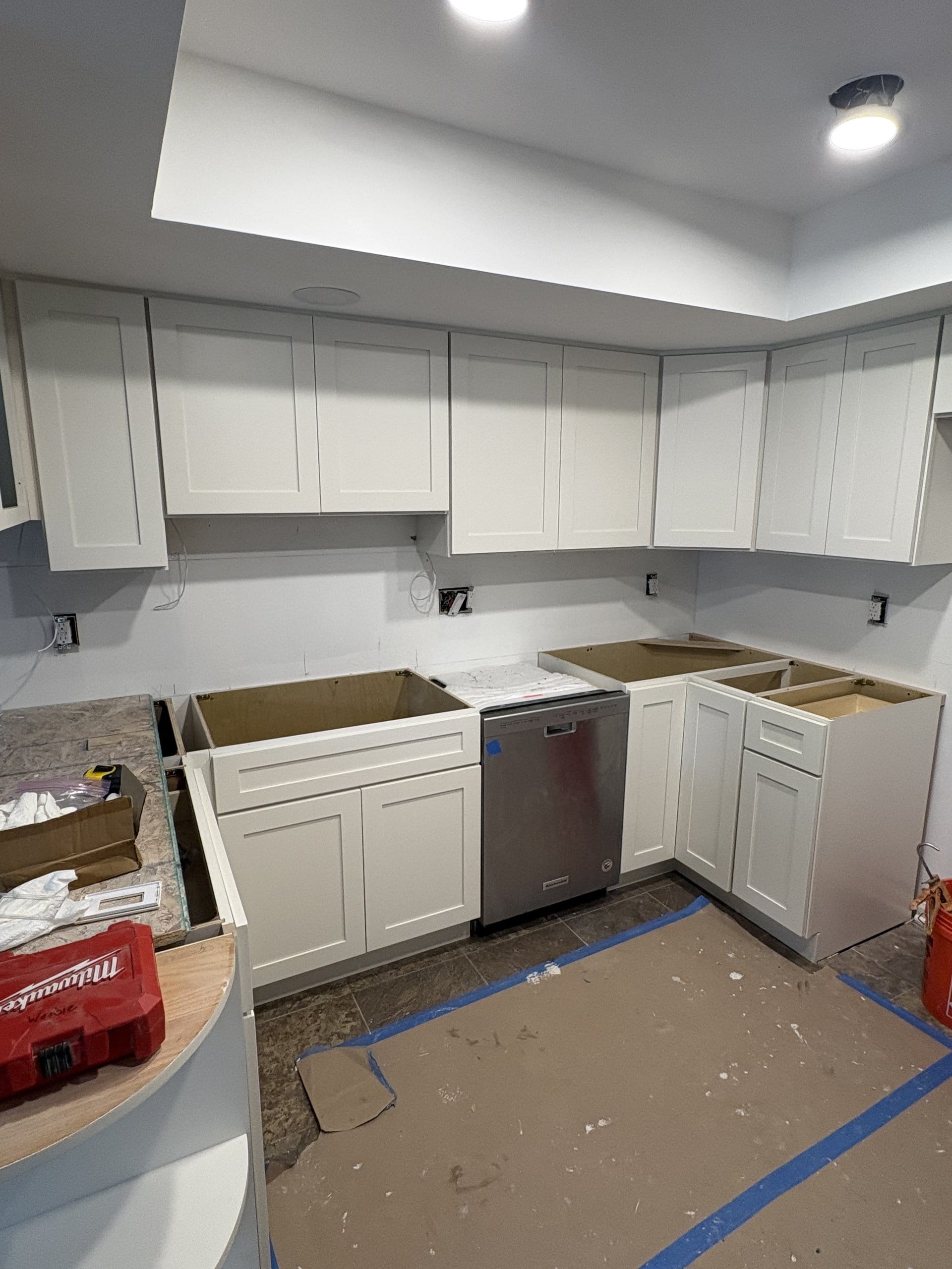 Construction progress on the kitchen uppers and peninsula